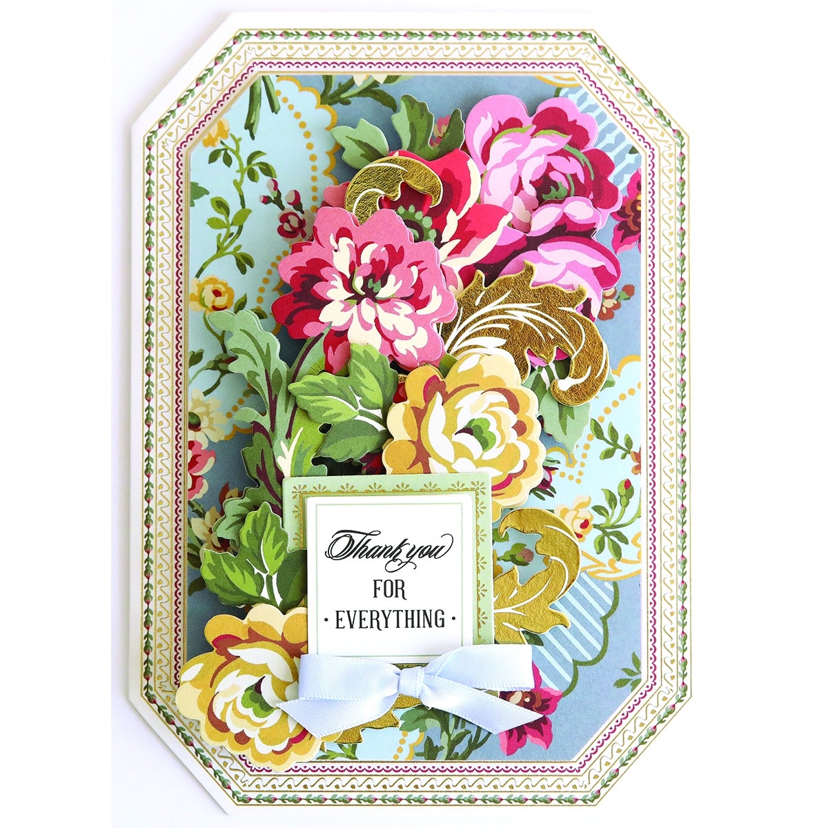 A Simply Gratitude Card Making Kit with flowers and a bow.