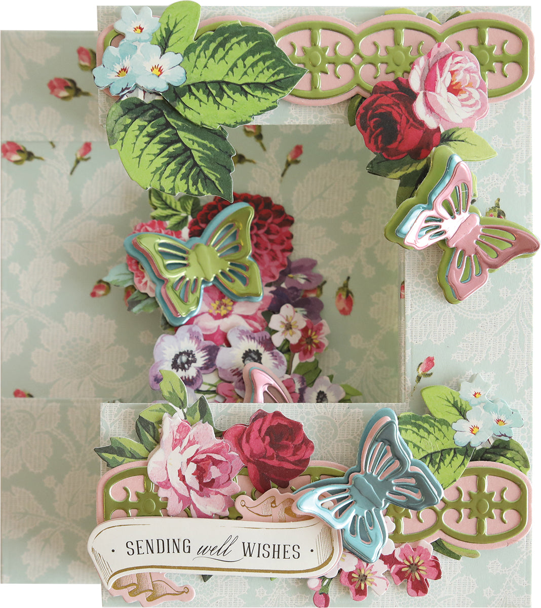 a close up of a card with flowers and butterflies.