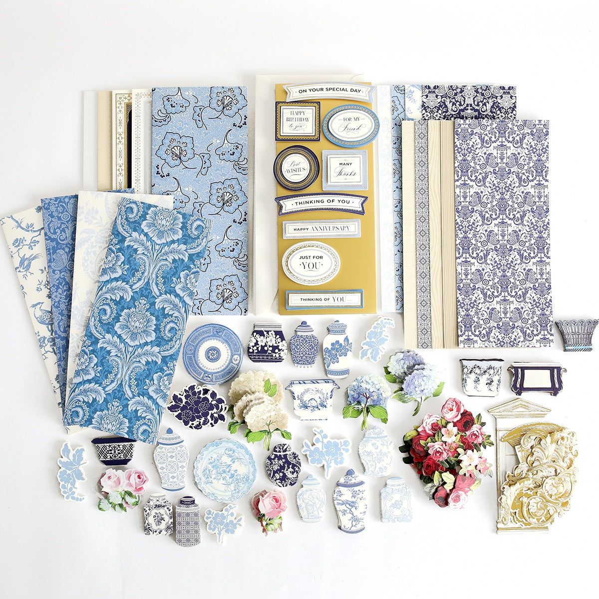 a table topped with lots of different types of paper.