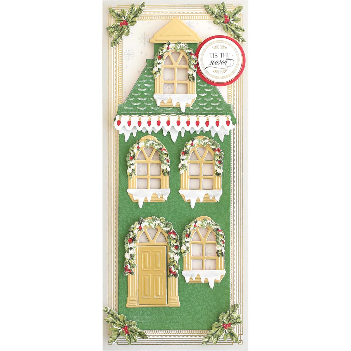 a christmas card with a house made out of paper.