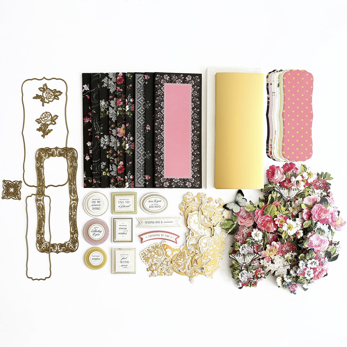 a table topped with lots of different types of paper.