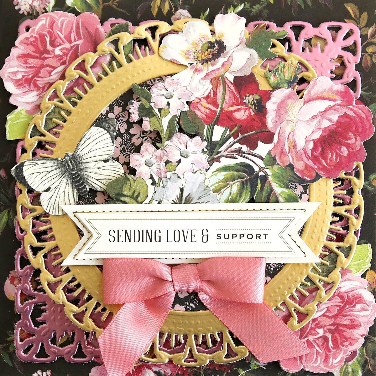 a close up of a card with flowers.