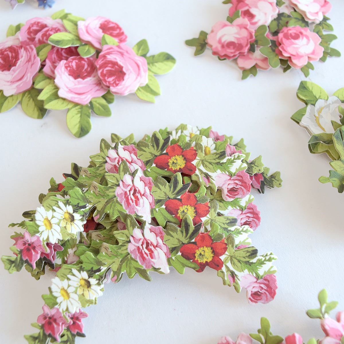 a bunch of flowers that are on a table.