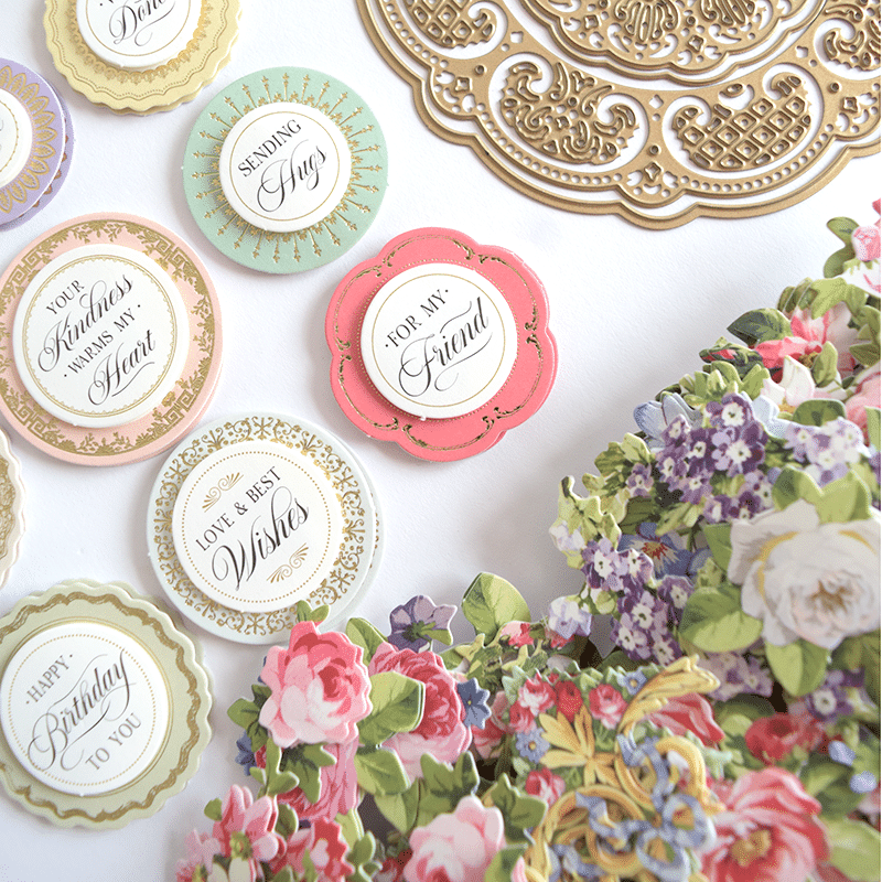 a table topped with lots of different colored plates.
