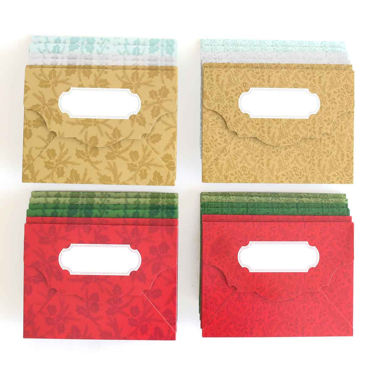 four different colored boxes sitting next to each other.