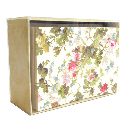 a flowered box is hanging on a wall.