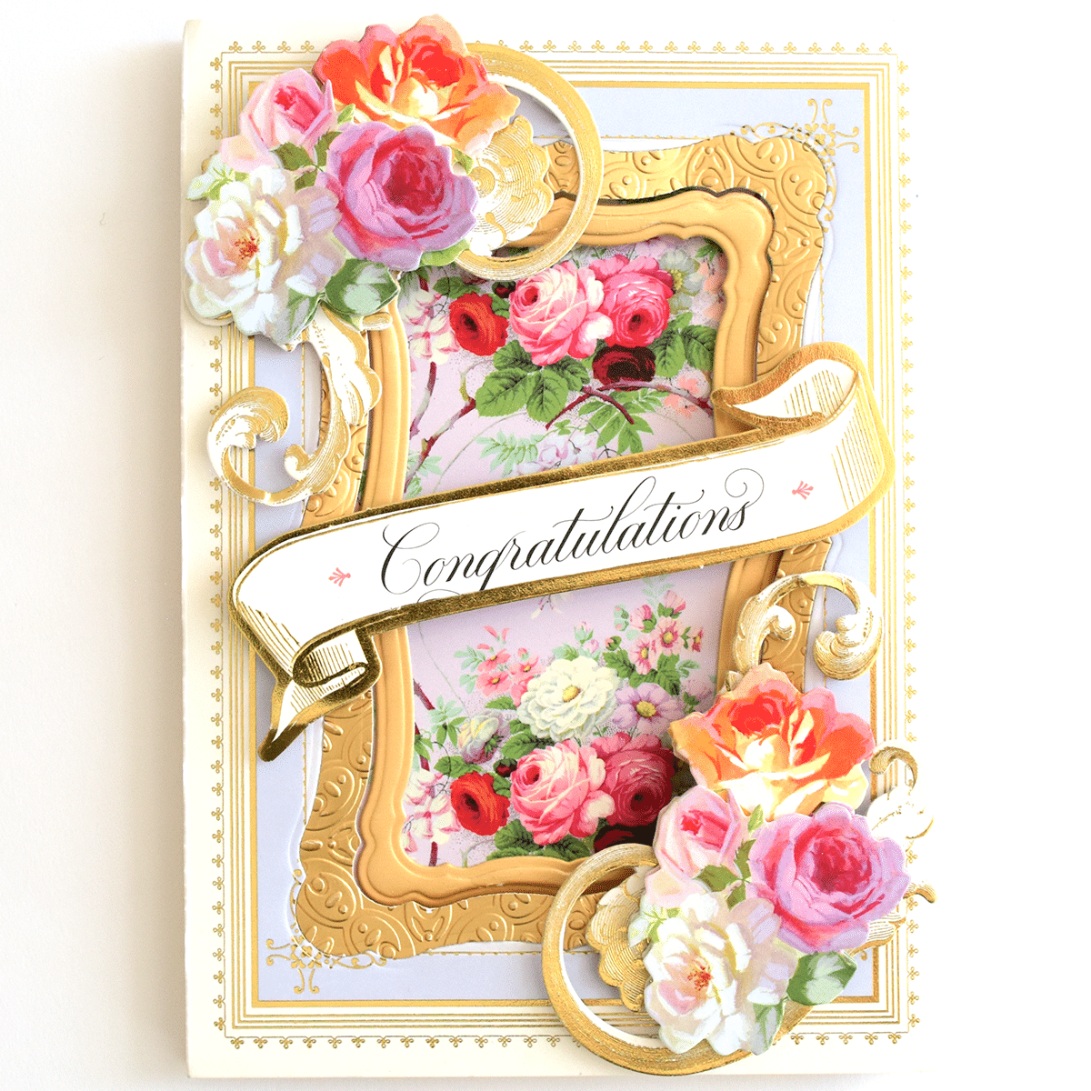 a congratulations card with flowers and a ribbon.