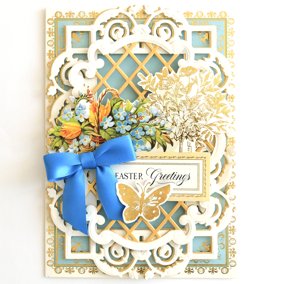 a close up of a card with a blue bow.