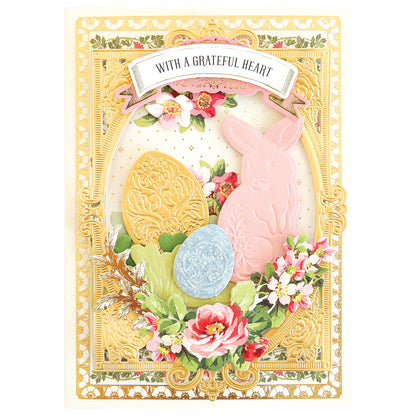 a card with a pink and blue bunny on it.
