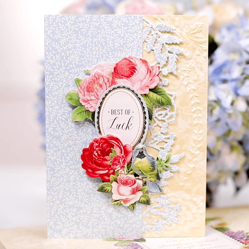 a close up of a card with flowers on it.