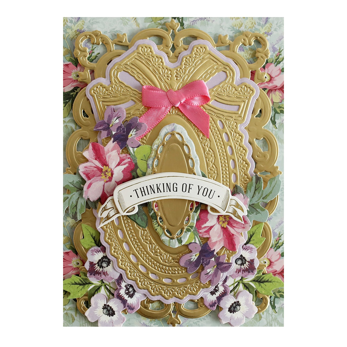 a close up of a card with flowers.