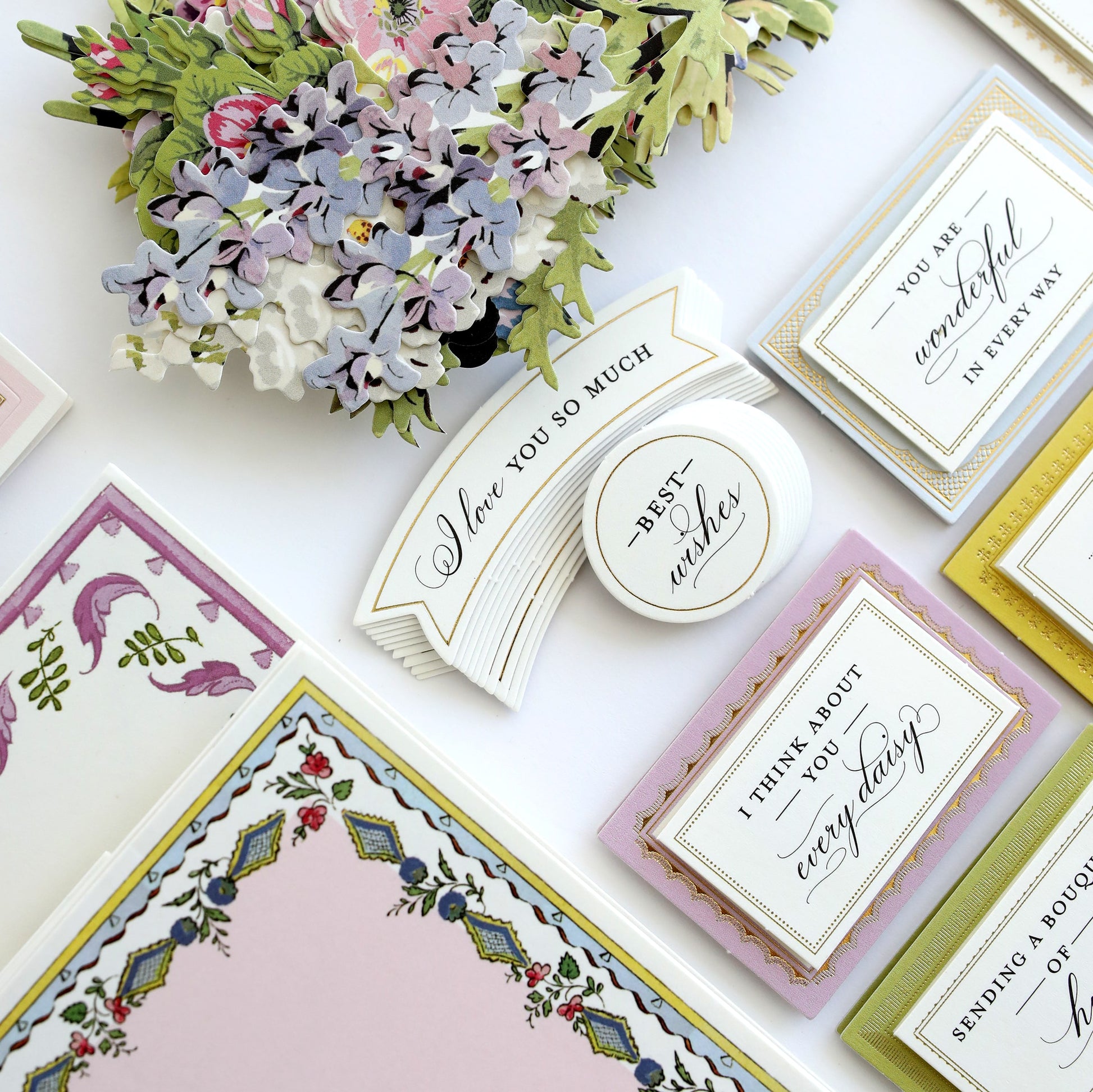 a table topped with lots of different types of cards.