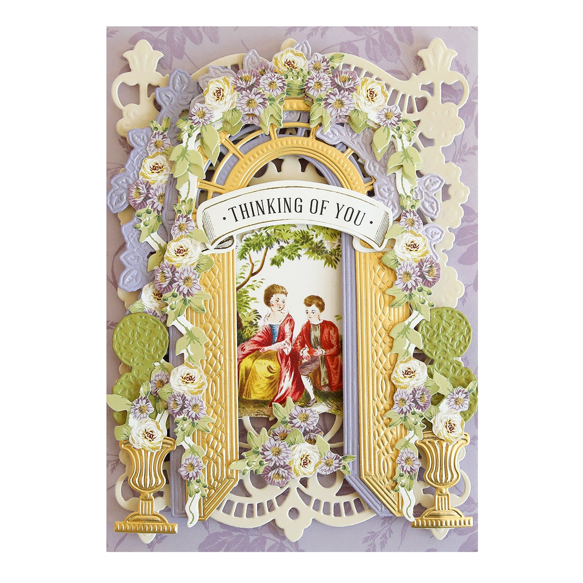 a card with a picture of two people sitting on a bench.