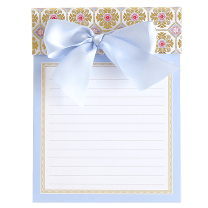 a card with a blue ribbon and a bow.