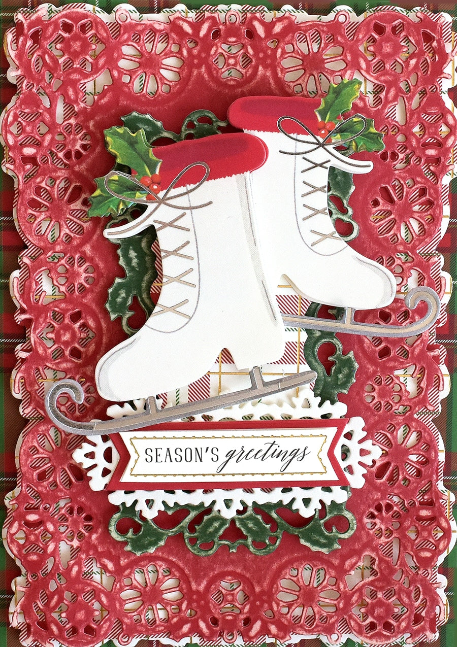 a christmas card with a pair of ice skates.
