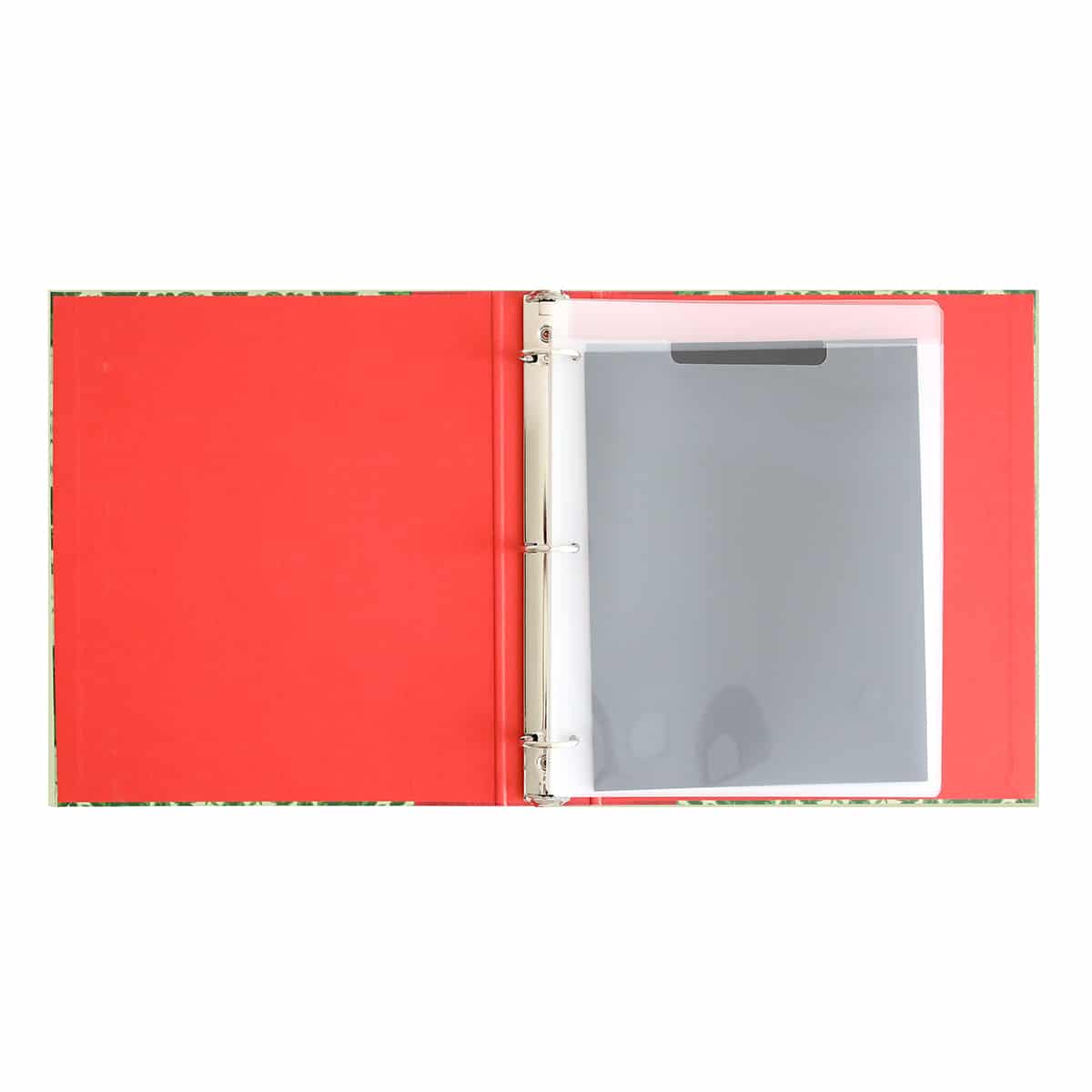 A Holiday Die Storage Binder with a tablet in it.