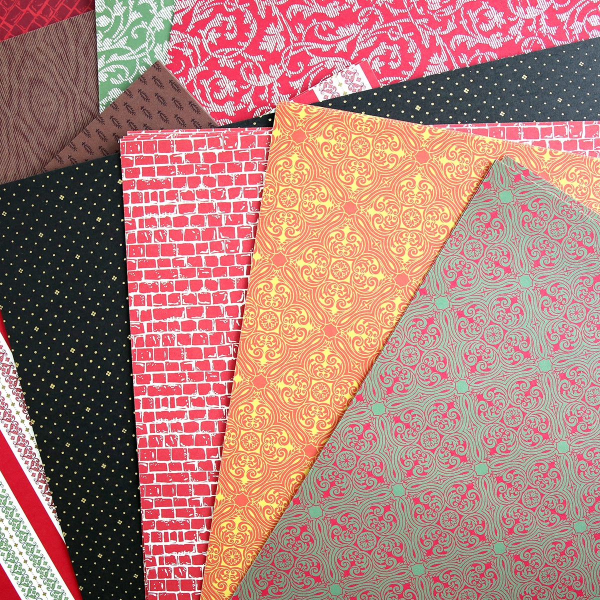a pile of different colored papers sitting on top of each other.