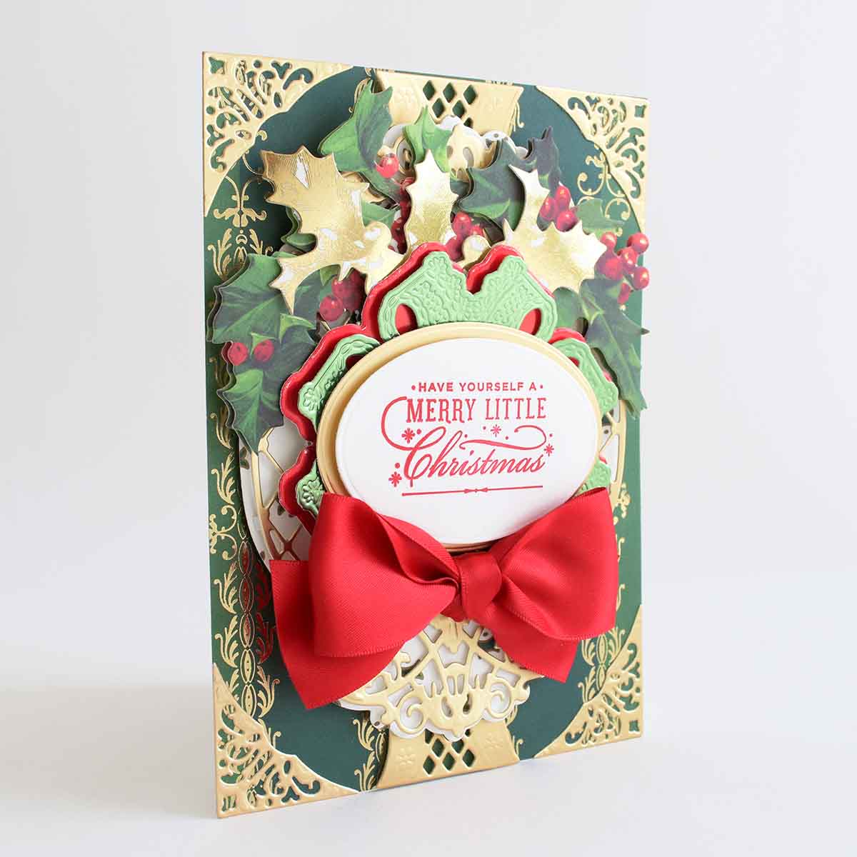 a merry little christmas card with a red bow.