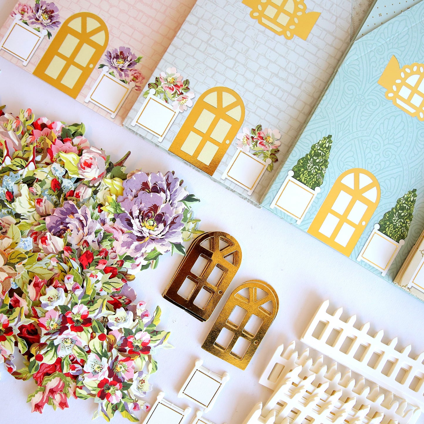 a table topped with lots of fake flowers.