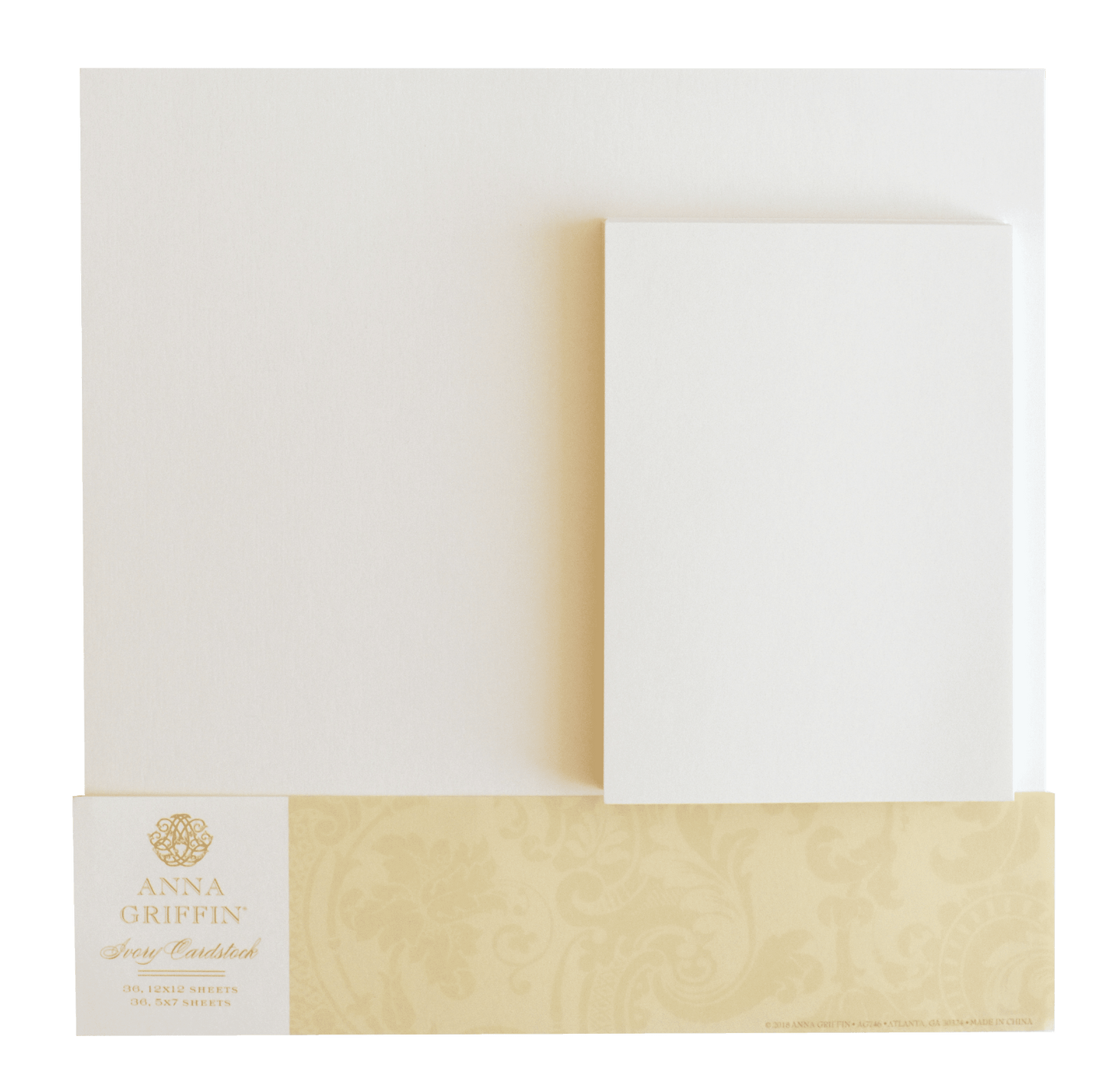 a close up of a white envelope with a gold ribbon.