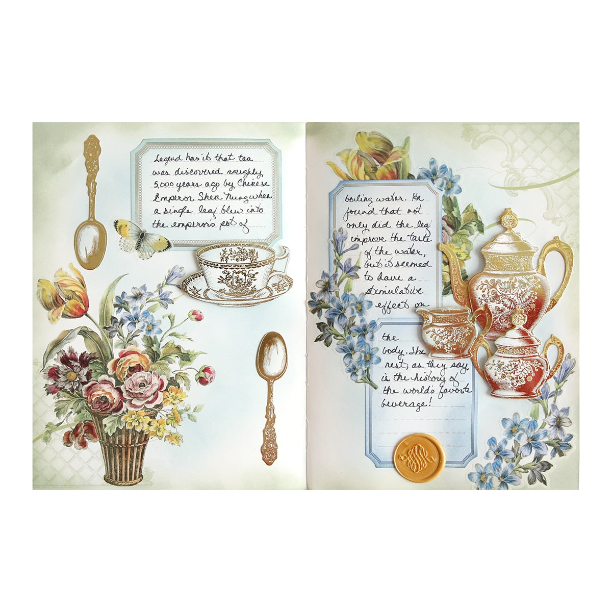 an open book with a picture of a teapot and flowers.