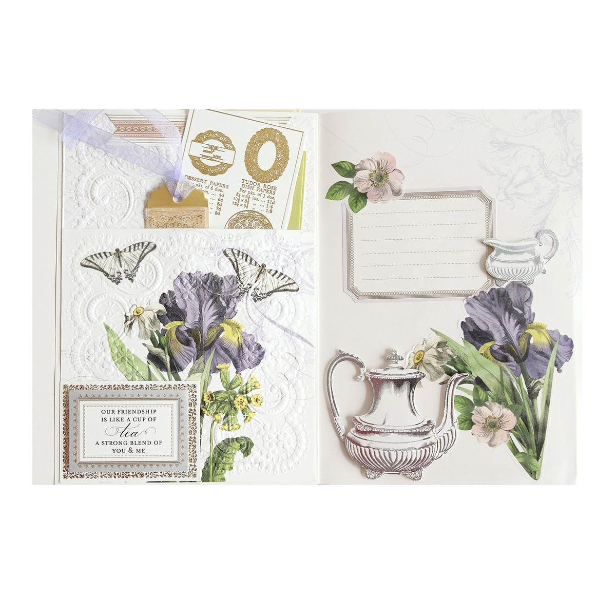 an open book with a picture of a vase and flowers.