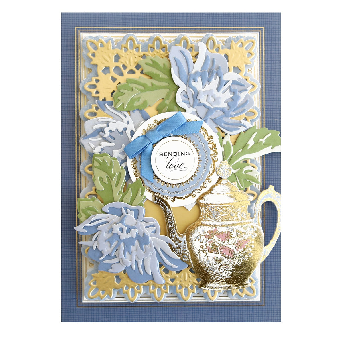 a card with a teapot and flowers on it.