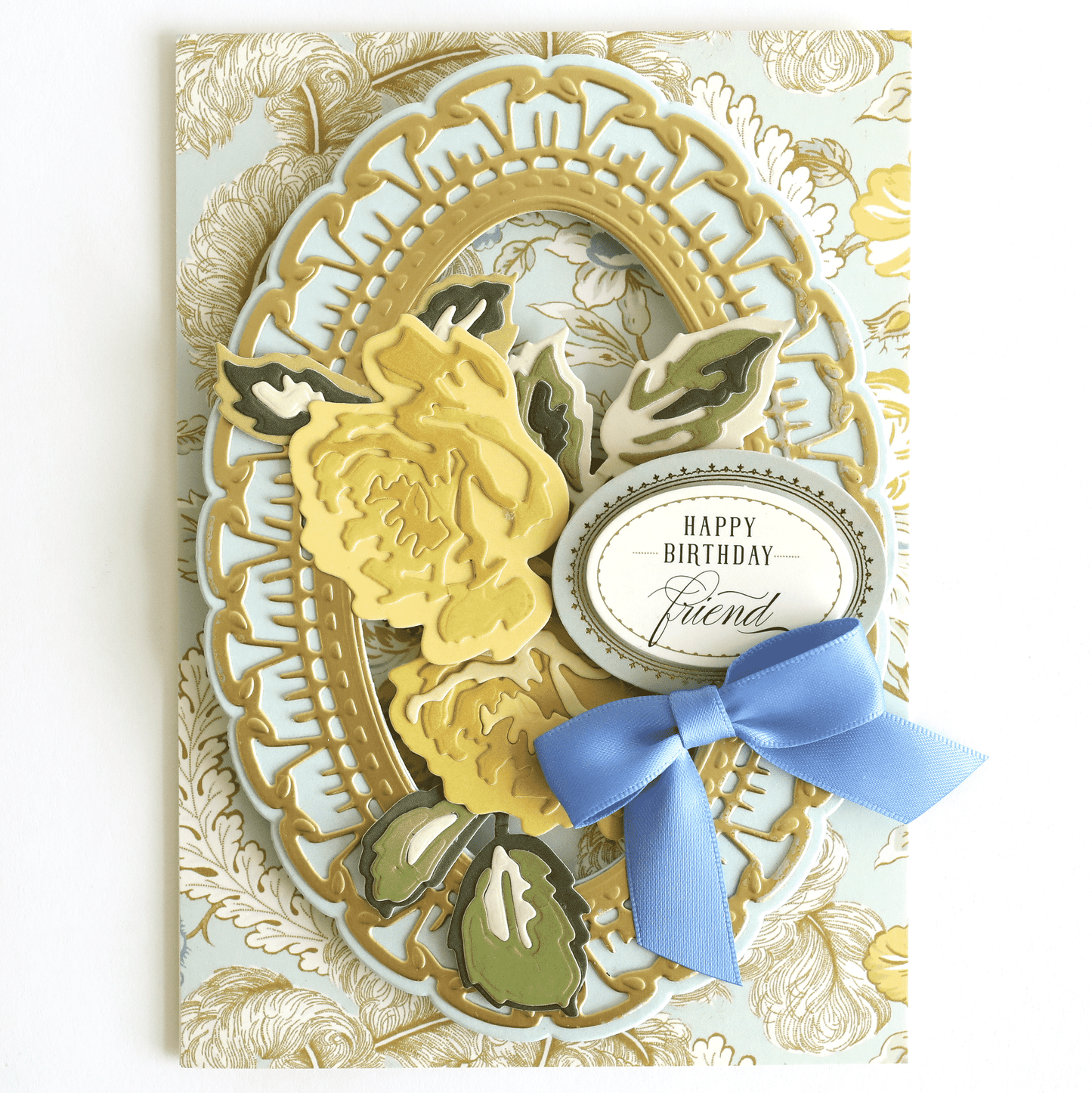 a close up of a birthday card with a blue ribbon.