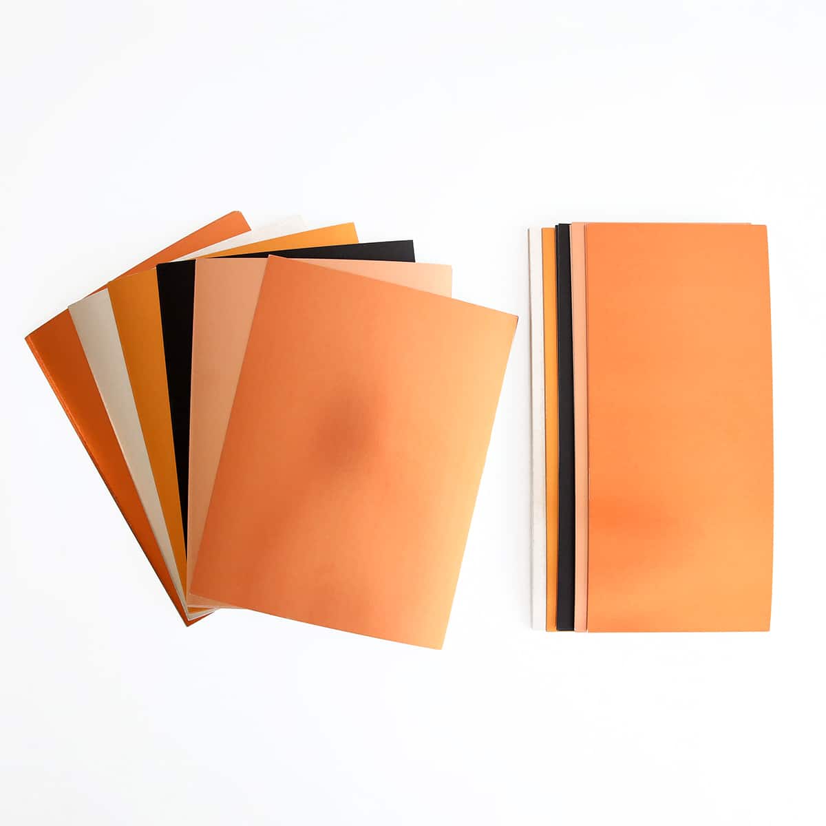 A set of Luxury Fall Matte Foil Cardstock notebooks on a white surface.
