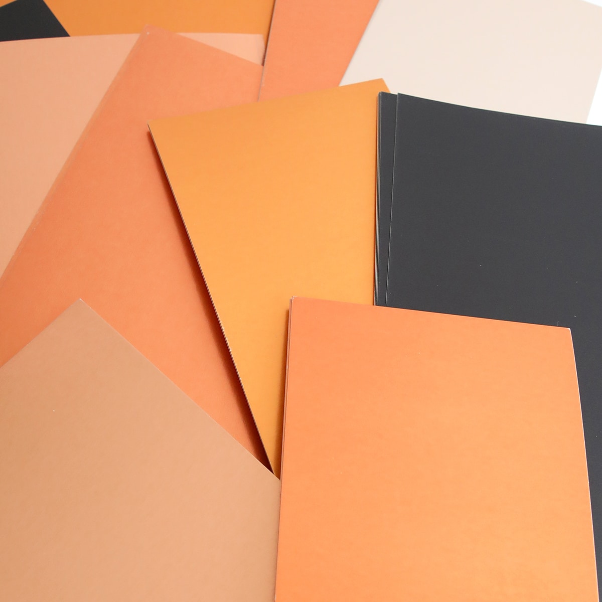 A pile of Luxury Fall Matte Foil Cardstock papers.