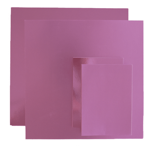 a set of three pink sheets of paper.