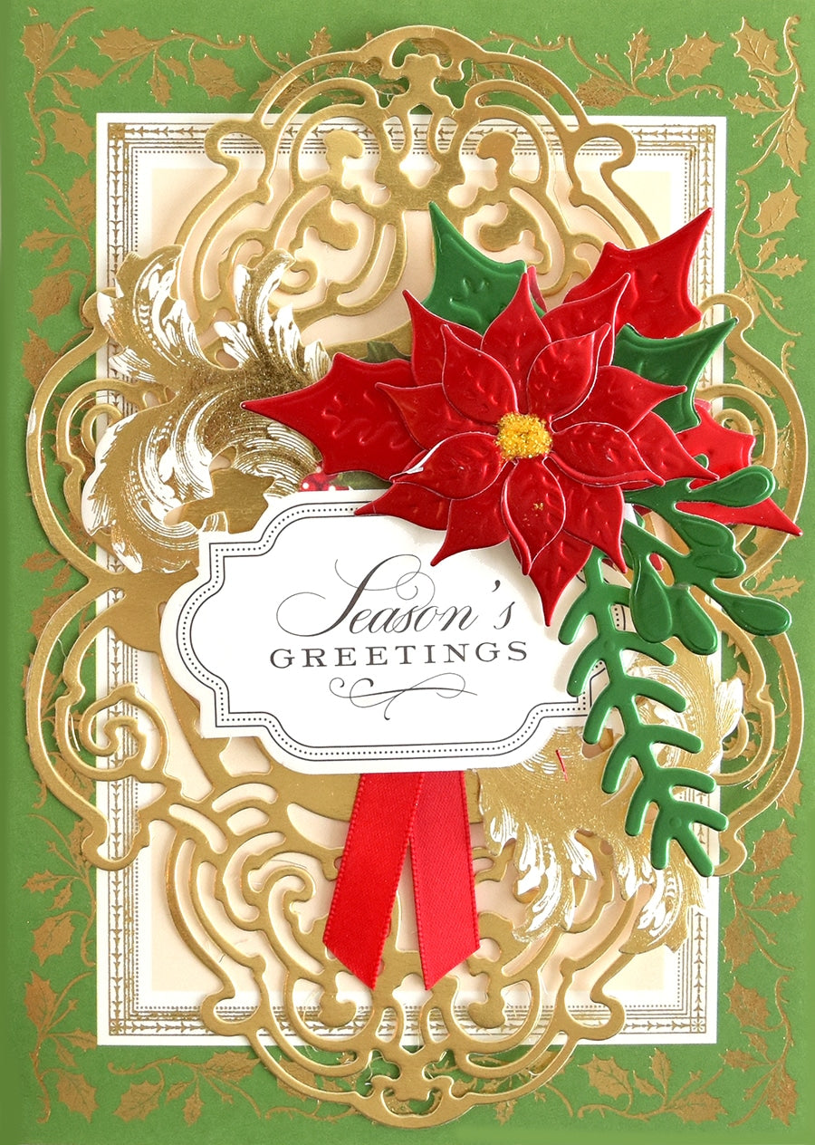 a christmas card with a poinsetti on it.