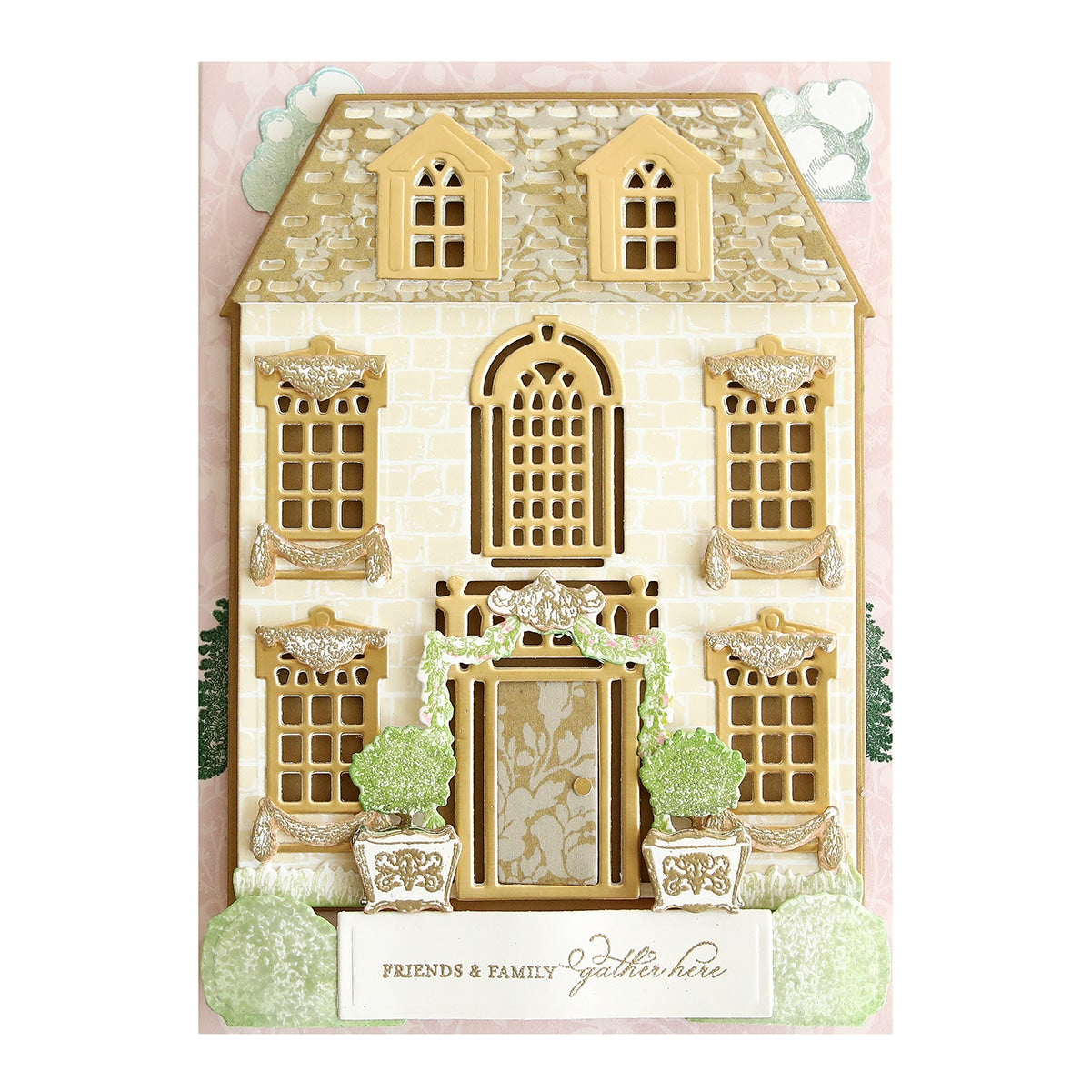 a card with a house made out of paper.