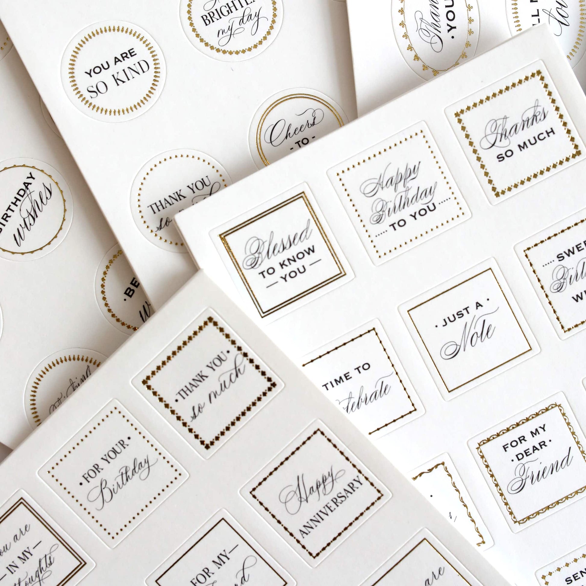 a table topped with lots of white envelopes.