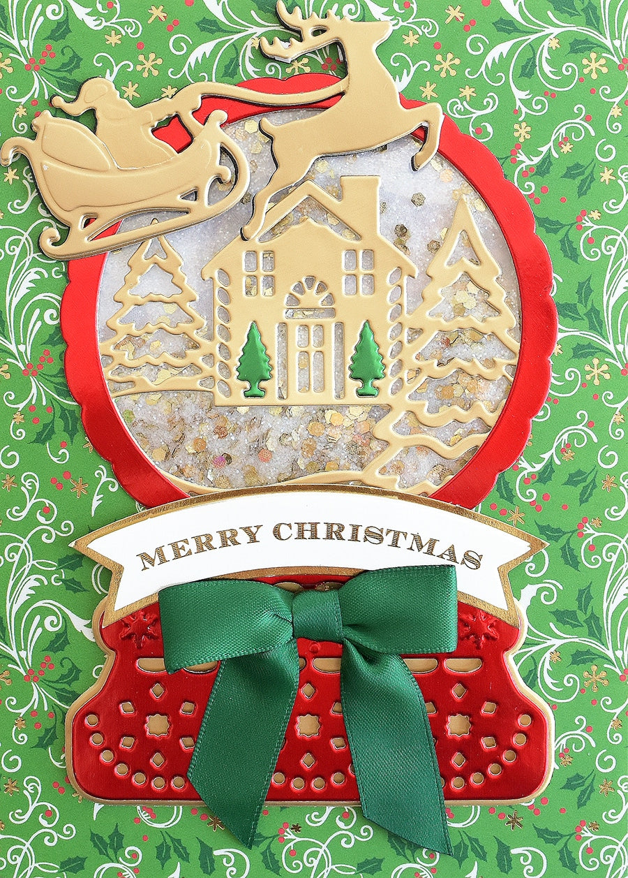 a christmas ornament with a santa sleigh on top of it.