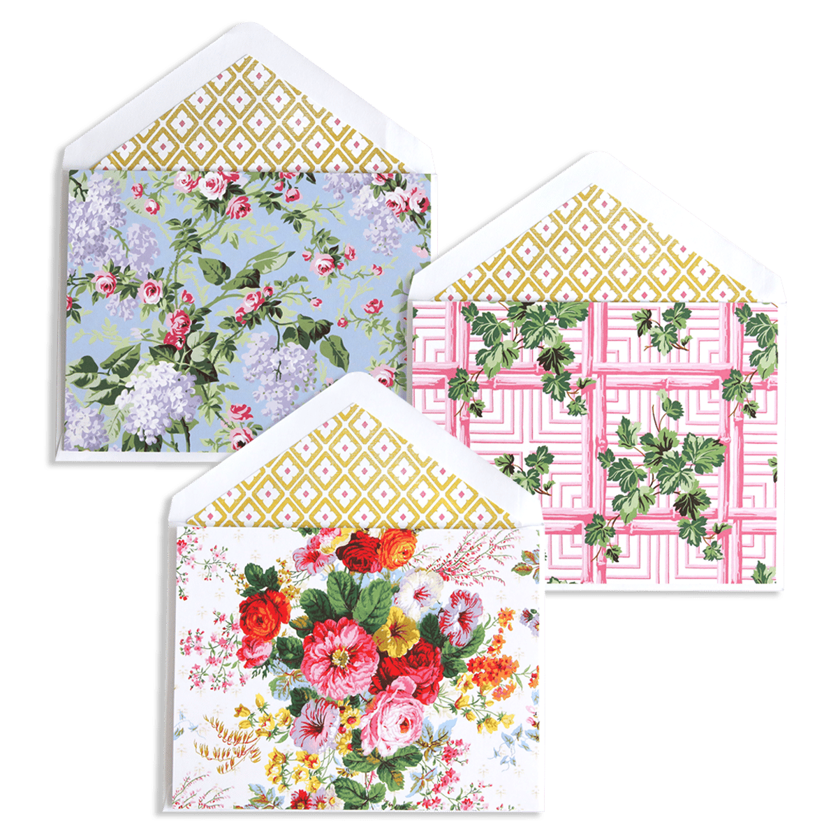 three coasters with flowers on them on a green background.