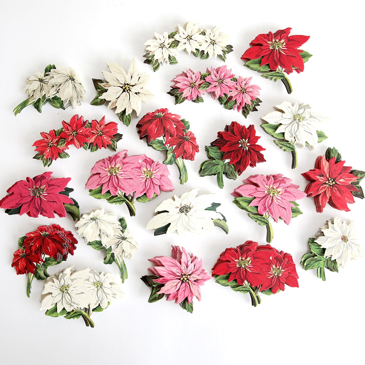 a bunch of flowers that are sitting on a table.