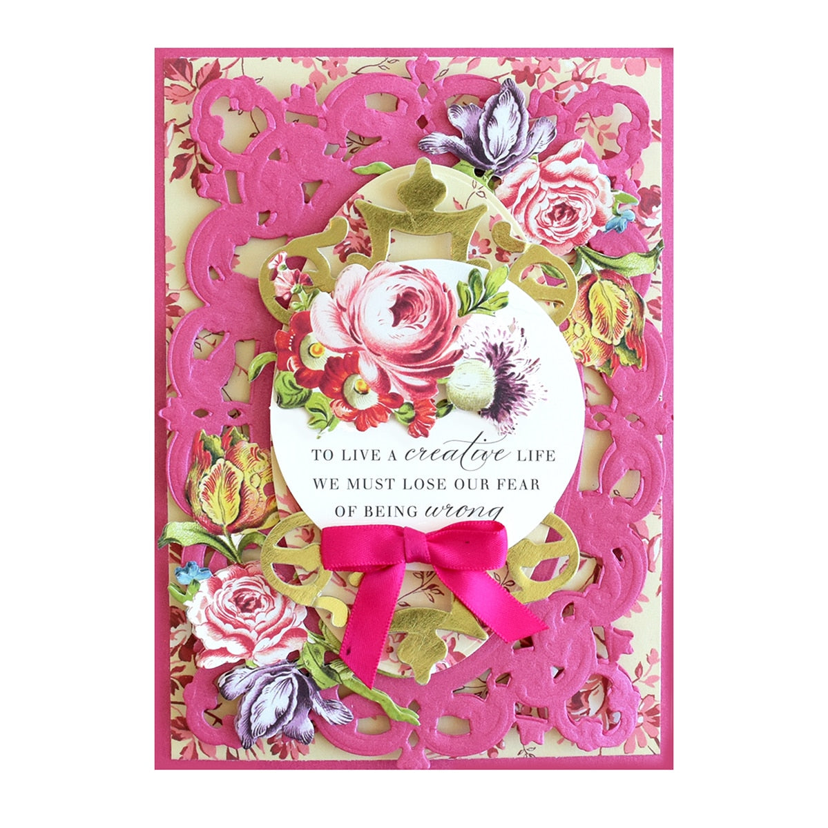 a card with a pink ribbon and flowers on it.