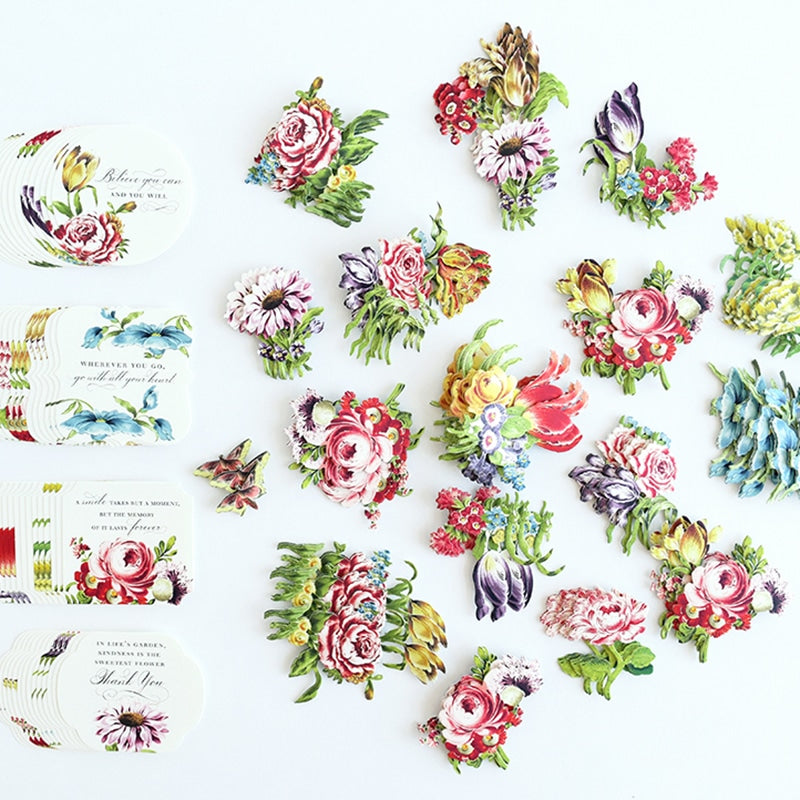 a table topped with lots of different types of flowers.