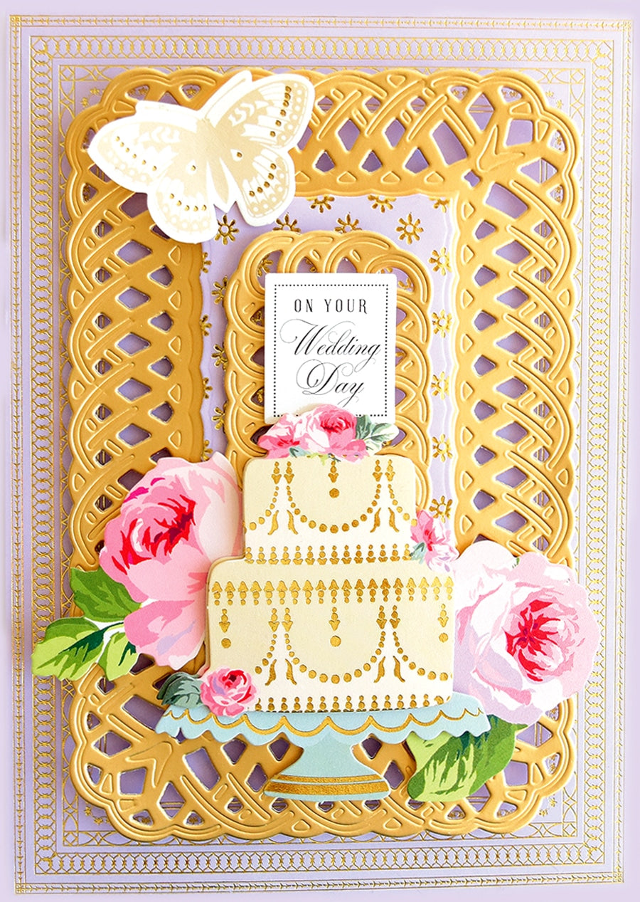 a card with a cake and flowers on it.