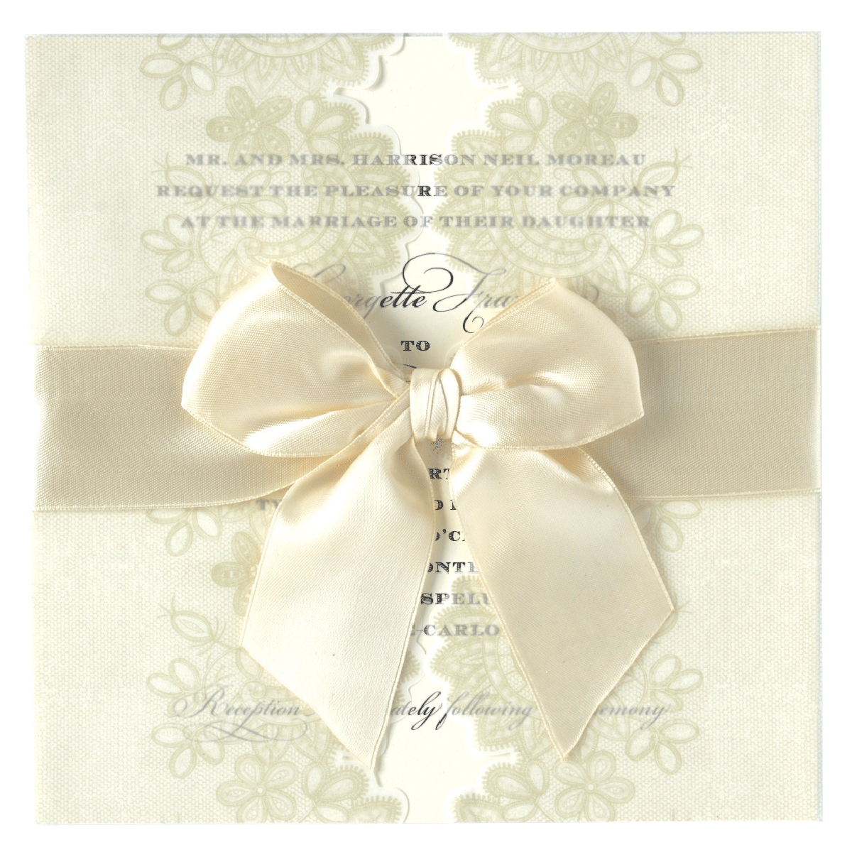 a wedding card with a bow on it.