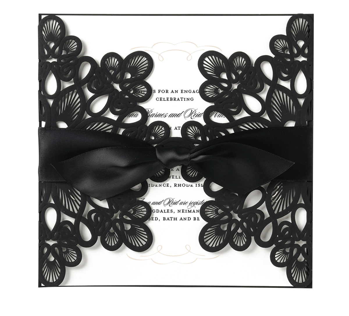 a black and white wedding card with a bow.