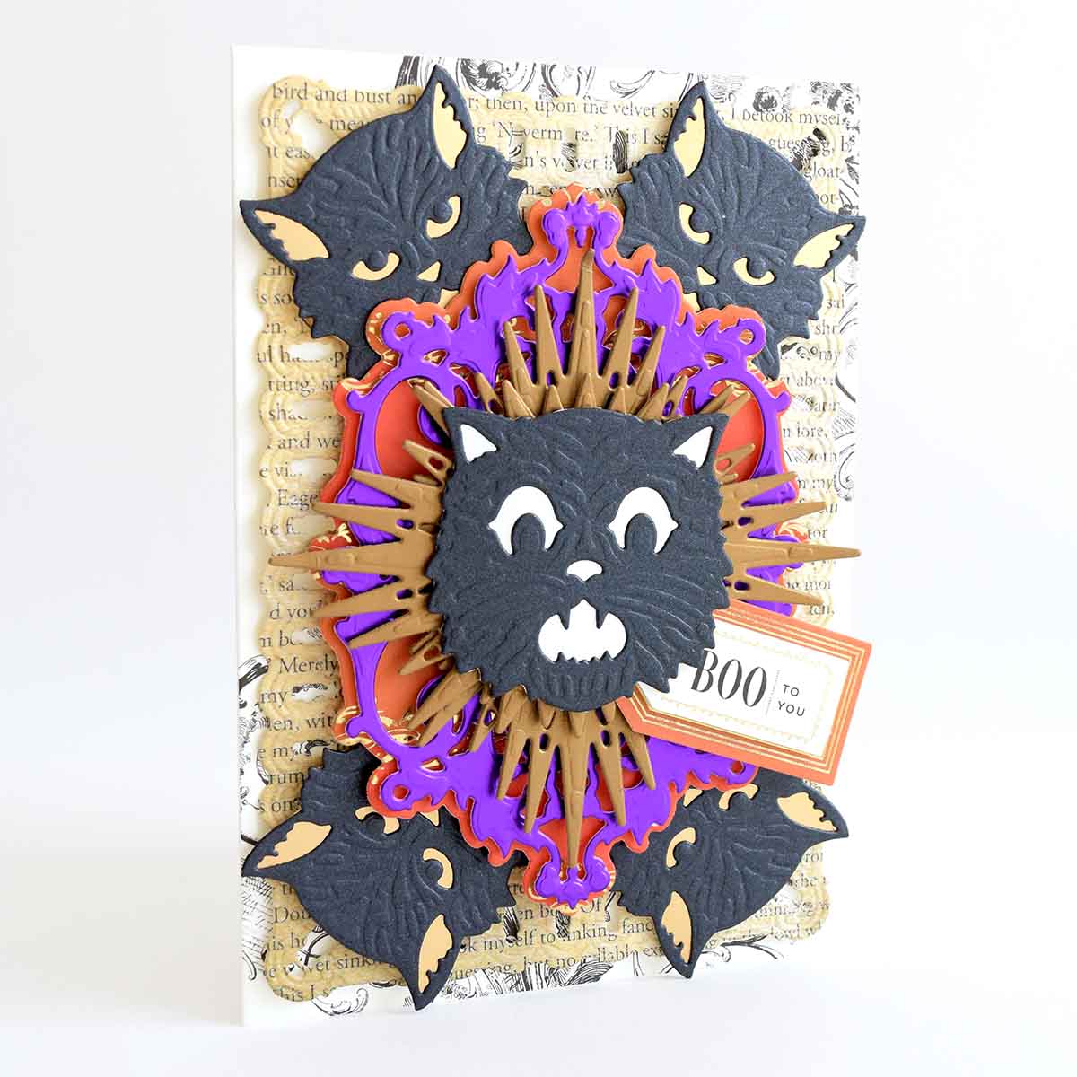 a close up of a card with a cat on it.
