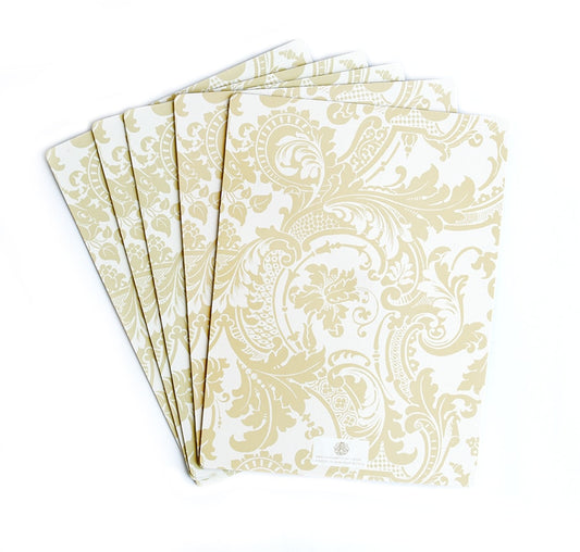 a set of four yellow and white napkins.