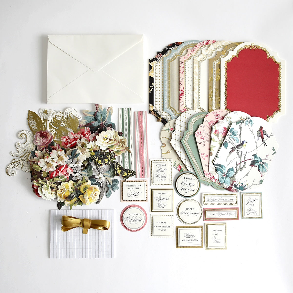 a white table topped with lots of different items.