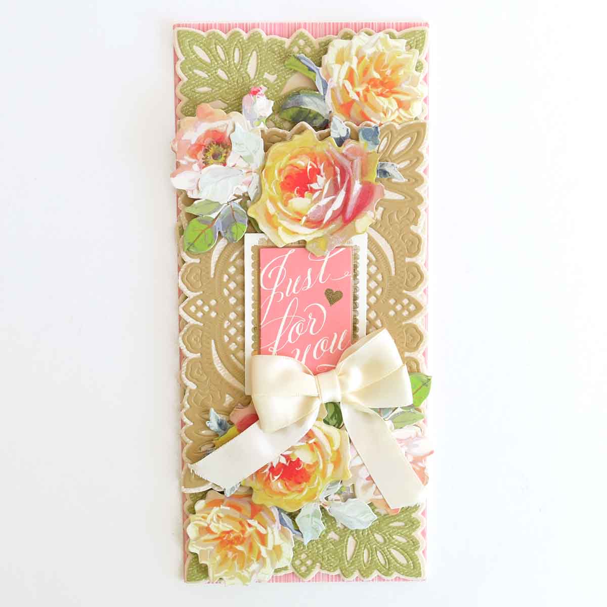 a card with flowers and a bow on it.