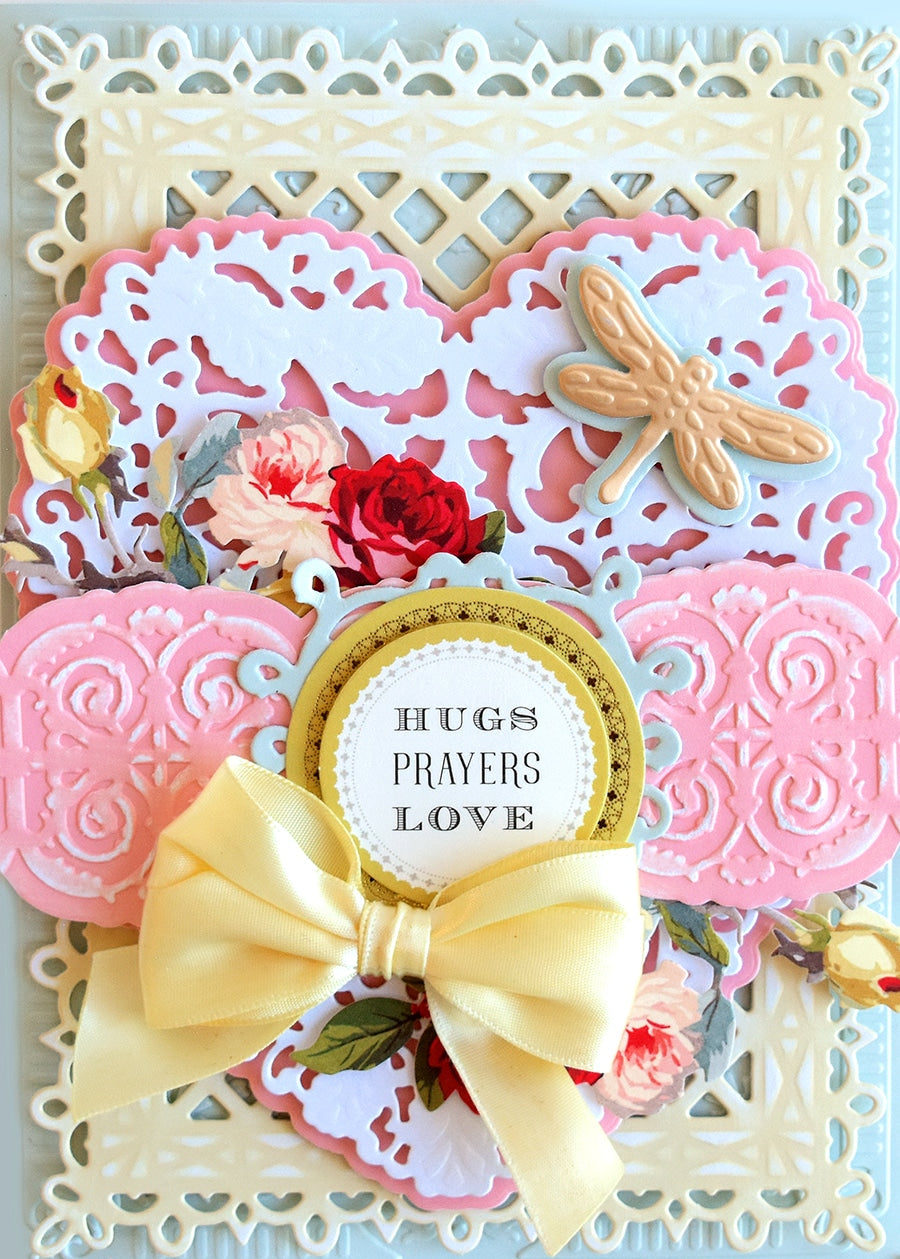 a close up of a card with flowers.