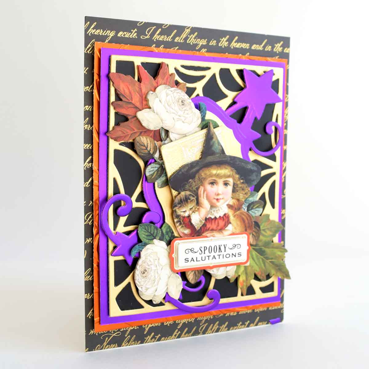 a card with a picture of a little girl wearing a witches hat.