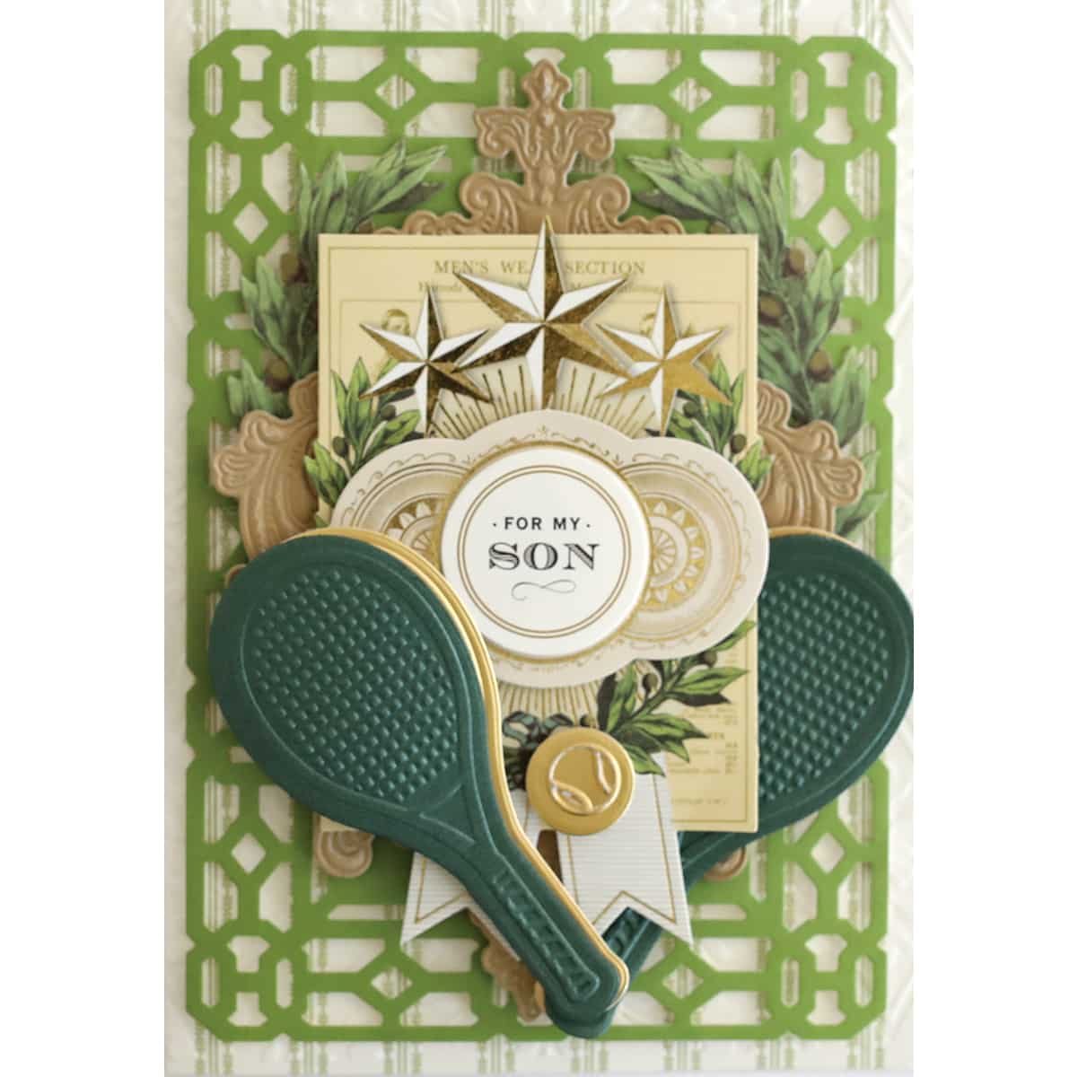 a close up of a card with a pair of scissors.