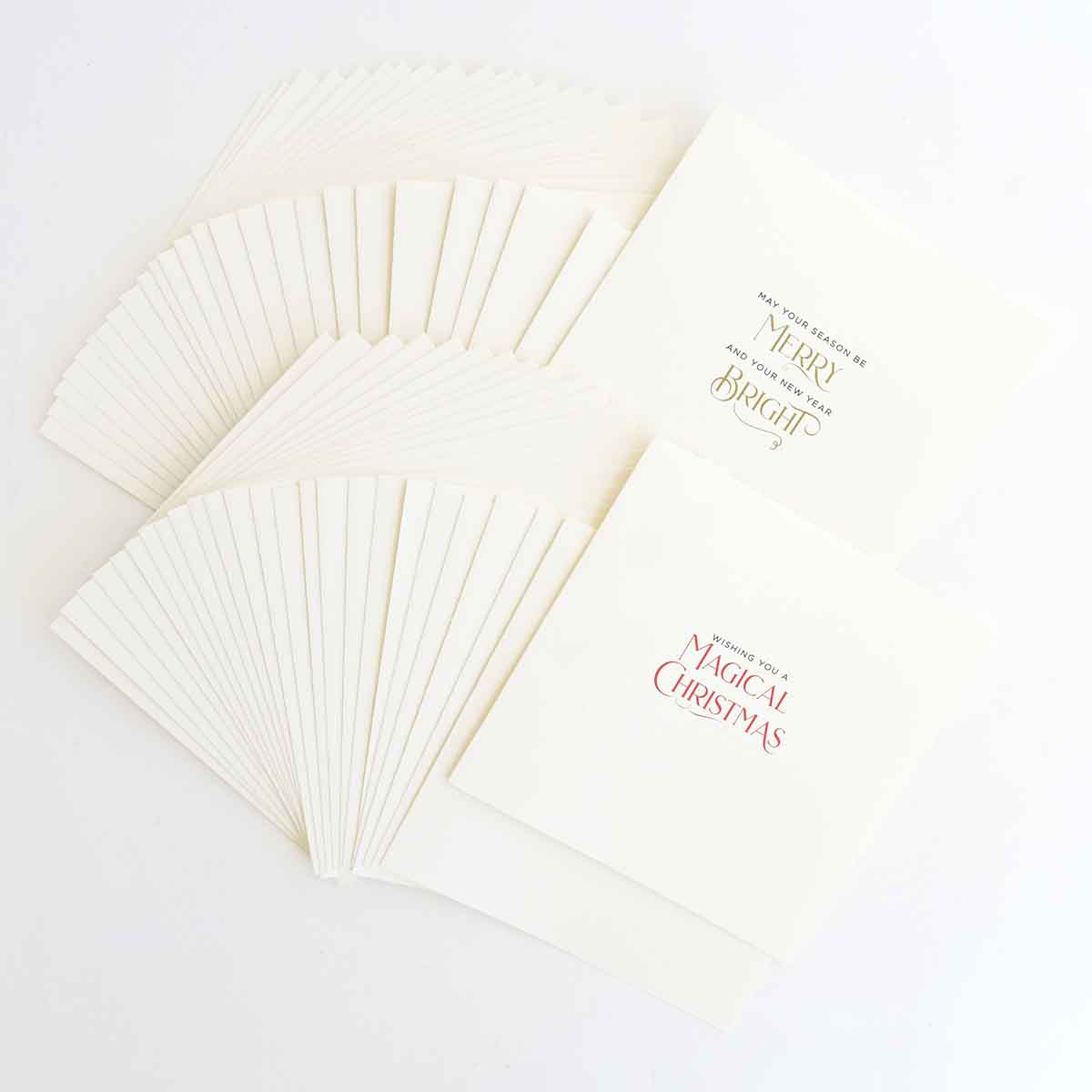a pile of white cards sitting on top of a table.